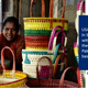 Sri Lankan woman with a hand-woven palm basket, 2015.